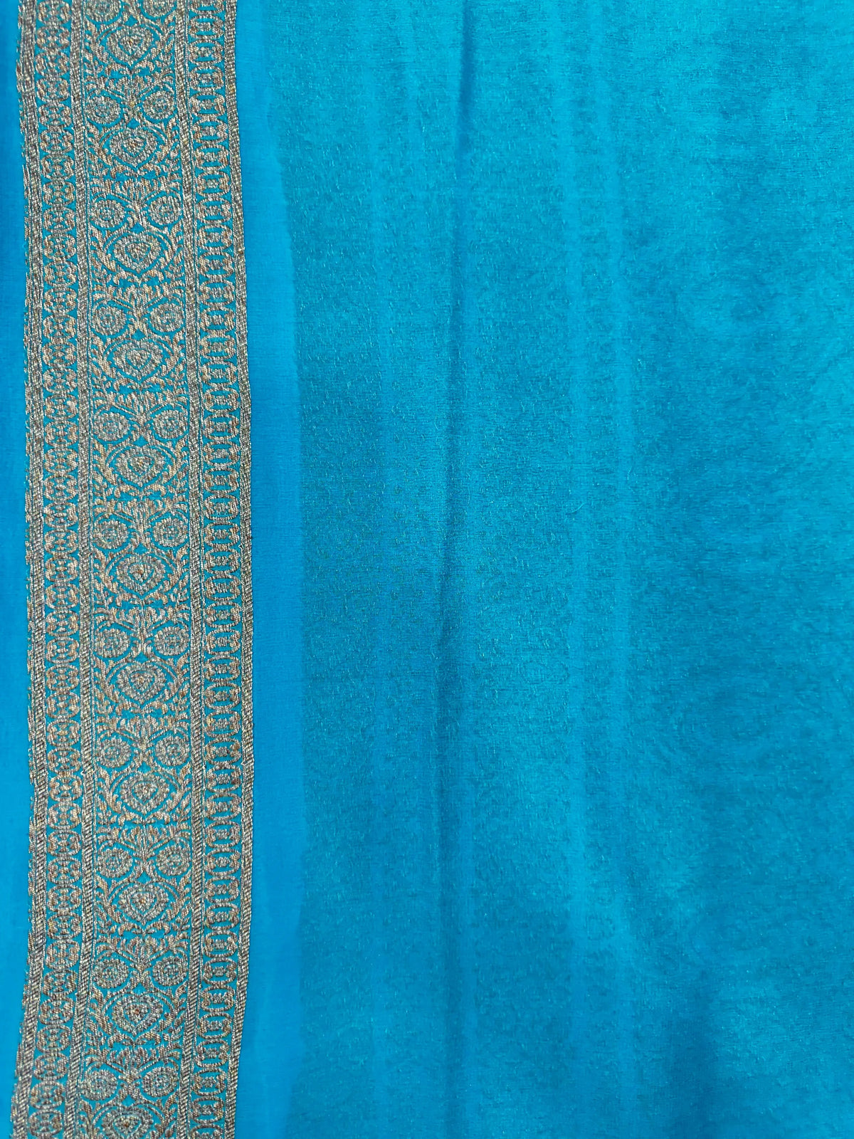 Pure Khaddi Georgette saree with handwoven zari detailing – perfect for festive and bridal wear