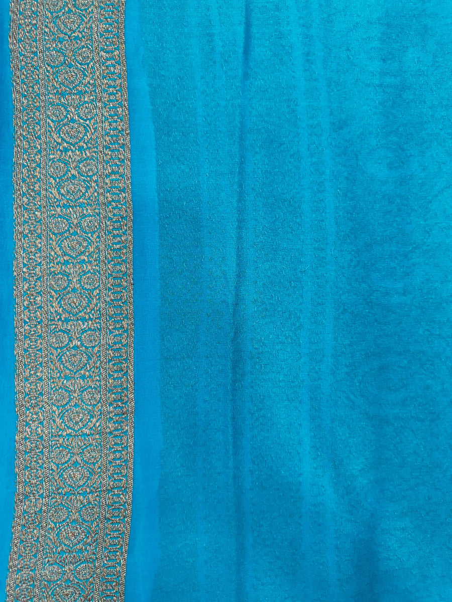 Pure Khaddi Georgette saree with handwoven zari detailing – perfect for festive and bridal wear