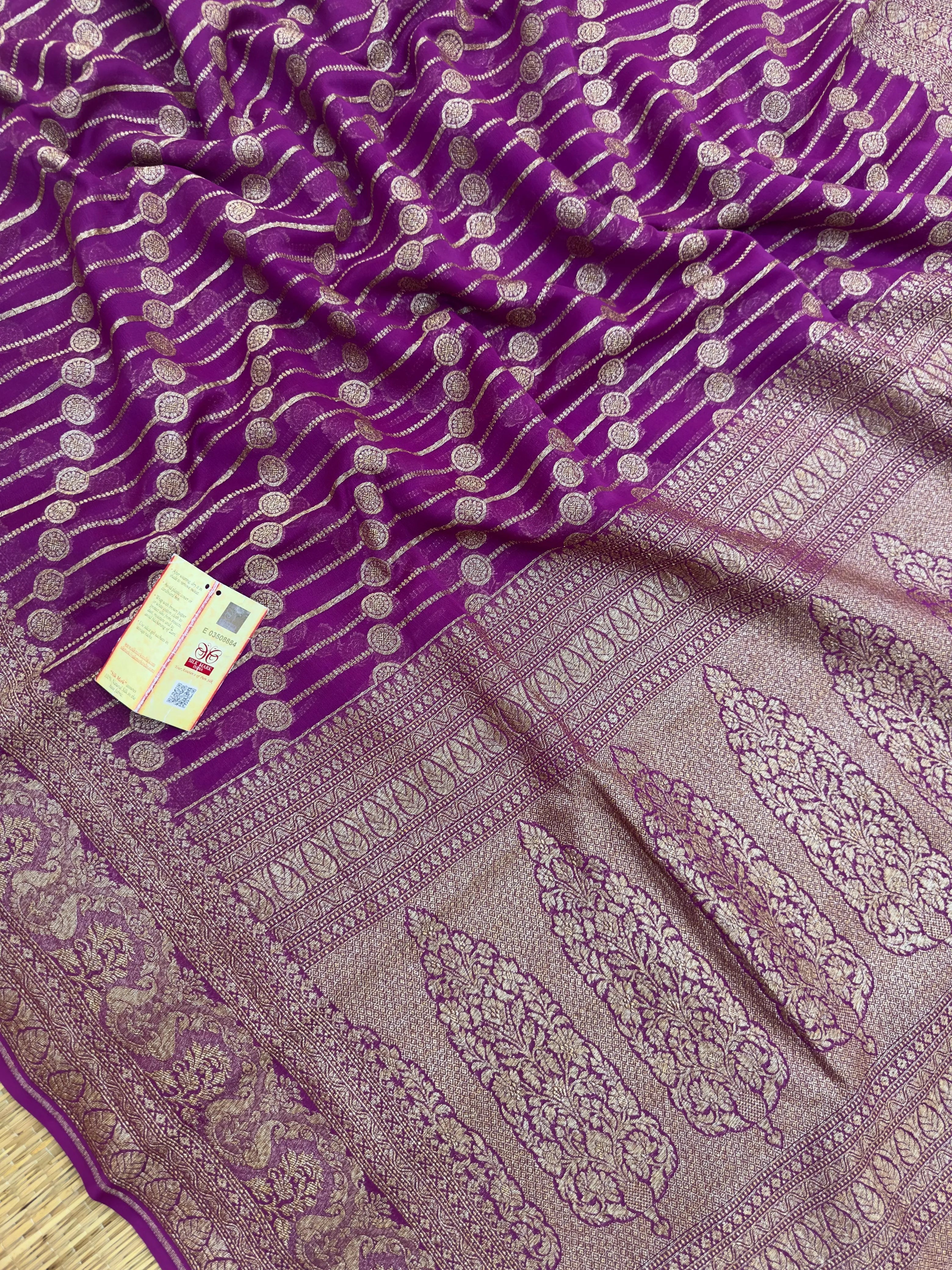 "Elegant pure Khaddi georgette silk saree, perfect for ethnic wear and wedding celebrations, offering a beautiful drape and intricate design for a sophisticated look."