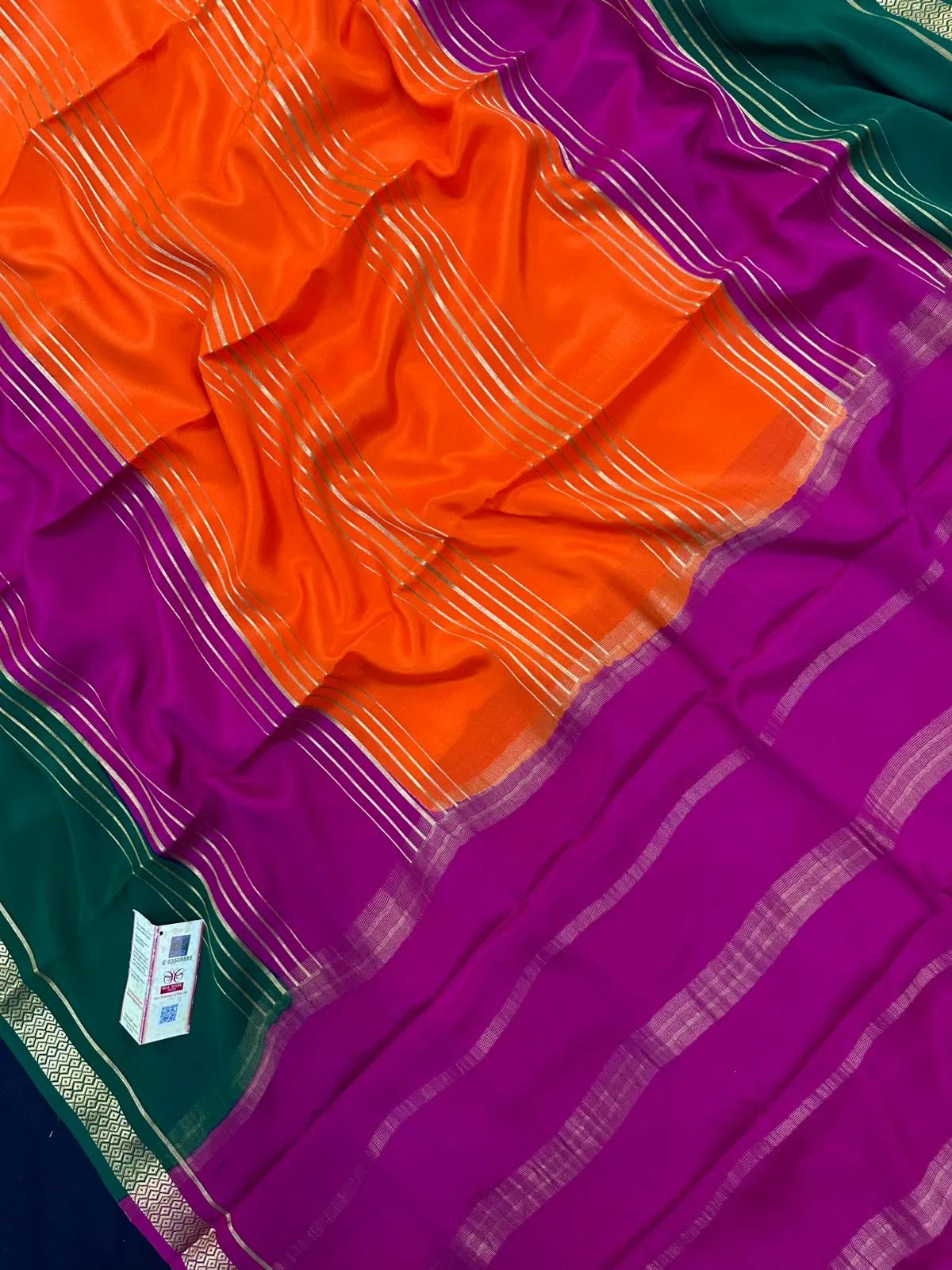 Woman wearing a Pure Mysore Crepe Silk Saree with lustrous sheen and elegant zari border, perfect for weddings and festive occasions.
