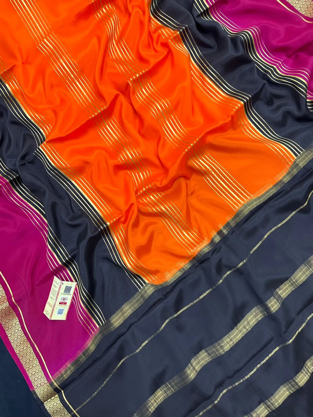 Woman wearing a Pure Mysore Crepe Silk Saree with lustrous sheen and elegant zari border, perfect for weddings and festive occasions.