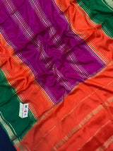 Woman wearing a Pure Mysore Crepe Silk Saree with lustrous sheen and elegant zari border, perfect for weddings and festive occasions.