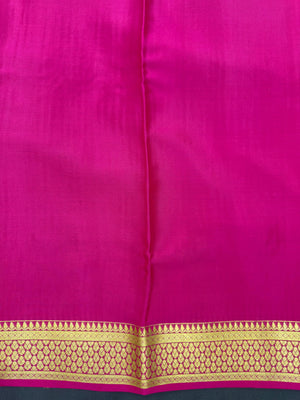 Pure Mysore silk saree with smooth texture and zari border – perfect for weddings and festive wear