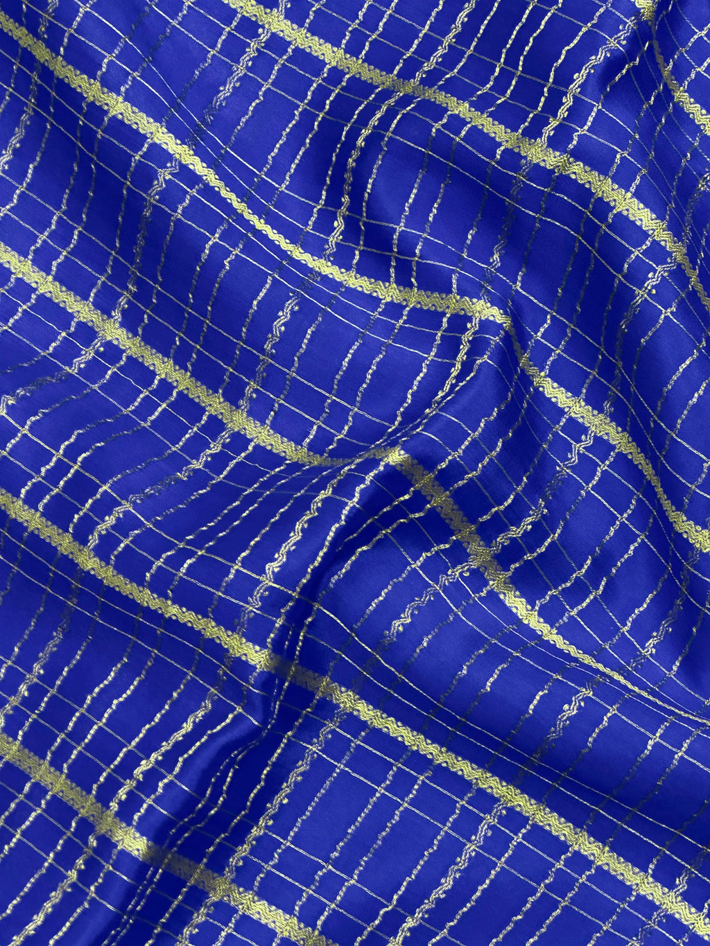 Pure Mysore silk saree with smooth texture and zari border – perfect for weddings and festive wear