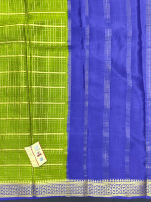 Pure Mysore silk saree with smooth texture and zari border – perfect for weddings and festive wear