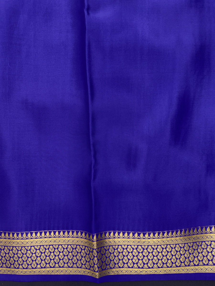 Pure Mysore silk saree with smooth texture and zari border – perfect for weddings and festive wear