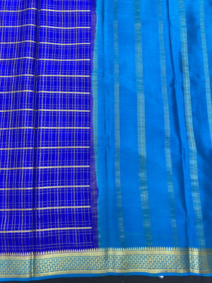 Pure Mysore silk saree with smooth texture and zari border – perfect for weddings and festive wear