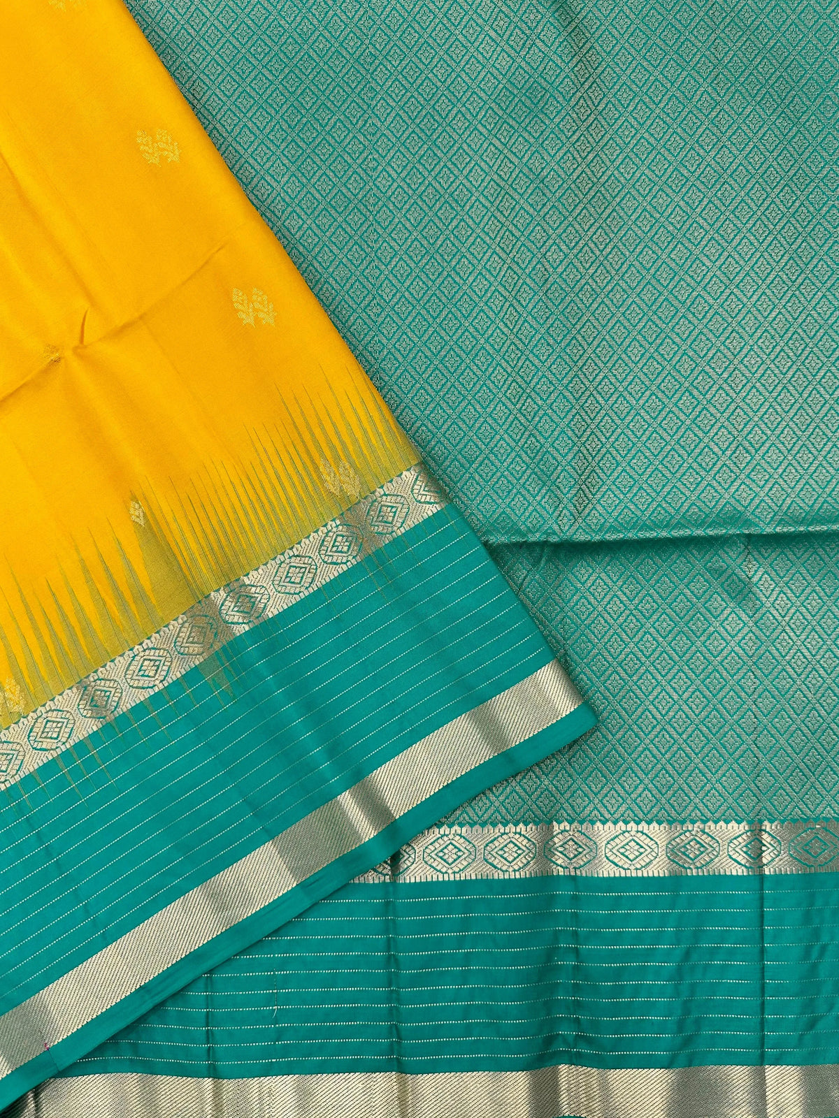 Woman wearing a Pure Silk Saree with glossy finish and intricate detailing, ideal for weddings and ethnic celebrations.