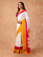 Woman draped in a Scarlet Chiffon Saree with vibrant red color and lightweight, flowy texture, perfect for weddings and festive events.
