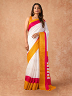 Woman draped in a Scarlet Chiffon Saree with vibrant red color and lightweight, flowy texture, perfect for weddings and festive events.