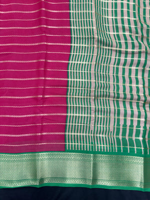 Woman draped in a Scarlet Chiffon Silk Saree with soft, flowing texture and elegant red hue, ideal for parties and festive occasions.