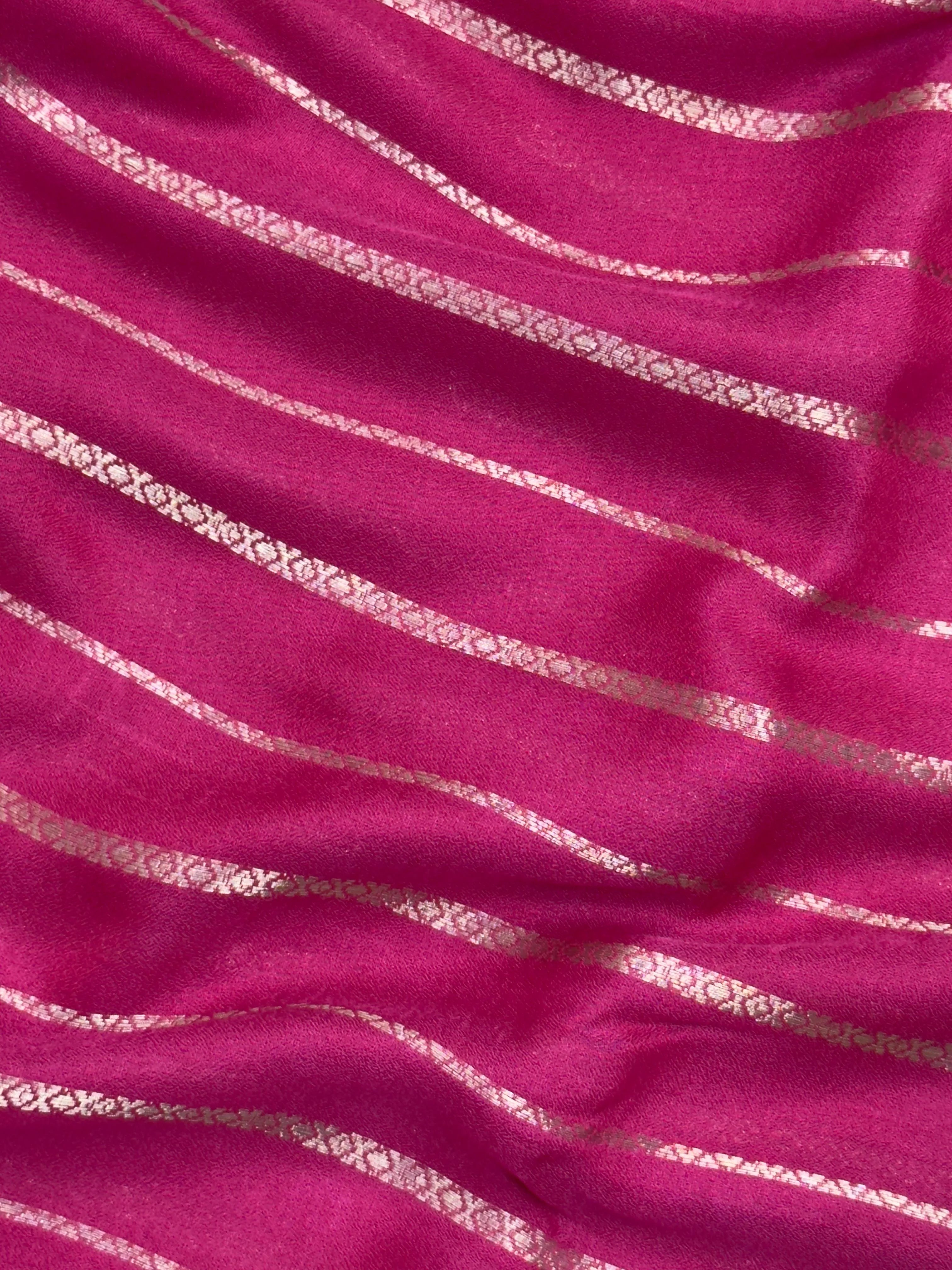 Woman draped in a Scarlet Chiffon Silk Saree with soft, flowing texture and elegant red hue, ideal for parties and festive occasions.