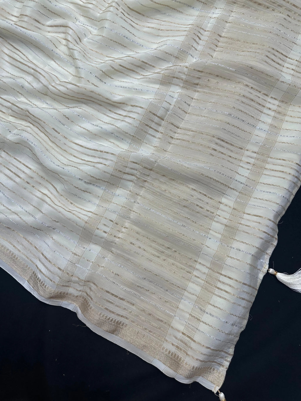 Woman draped in a Chiffon Silk Saree with soft, flowy texture and subtle sheen, perfect for parties and elegant ethnic occasions.