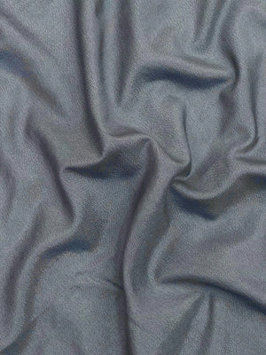 Woman draped in a Semi Crepe Silk Saree with soft texture and subtle shine, perfect for elegant office wear and festive occasions.