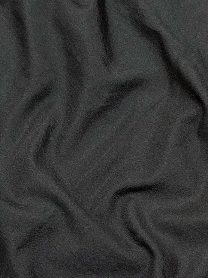 Woman draped in a Semi Crepe Silk Saree with soft texture and subtle shine, perfect for elegant office wear and festive occasions.