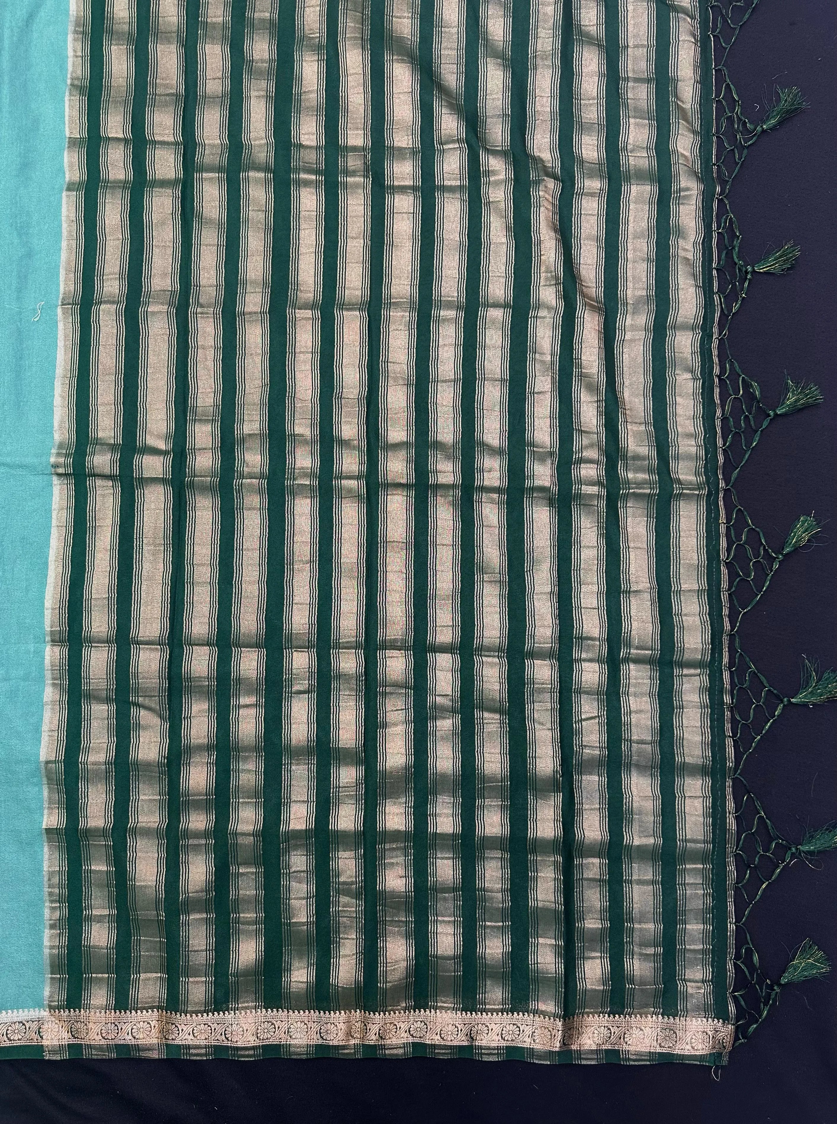 Woman draped in a Semi Crepe Silk Saree with soft texture and subtle shine, perfect for elegant office wear and festive occasions.
