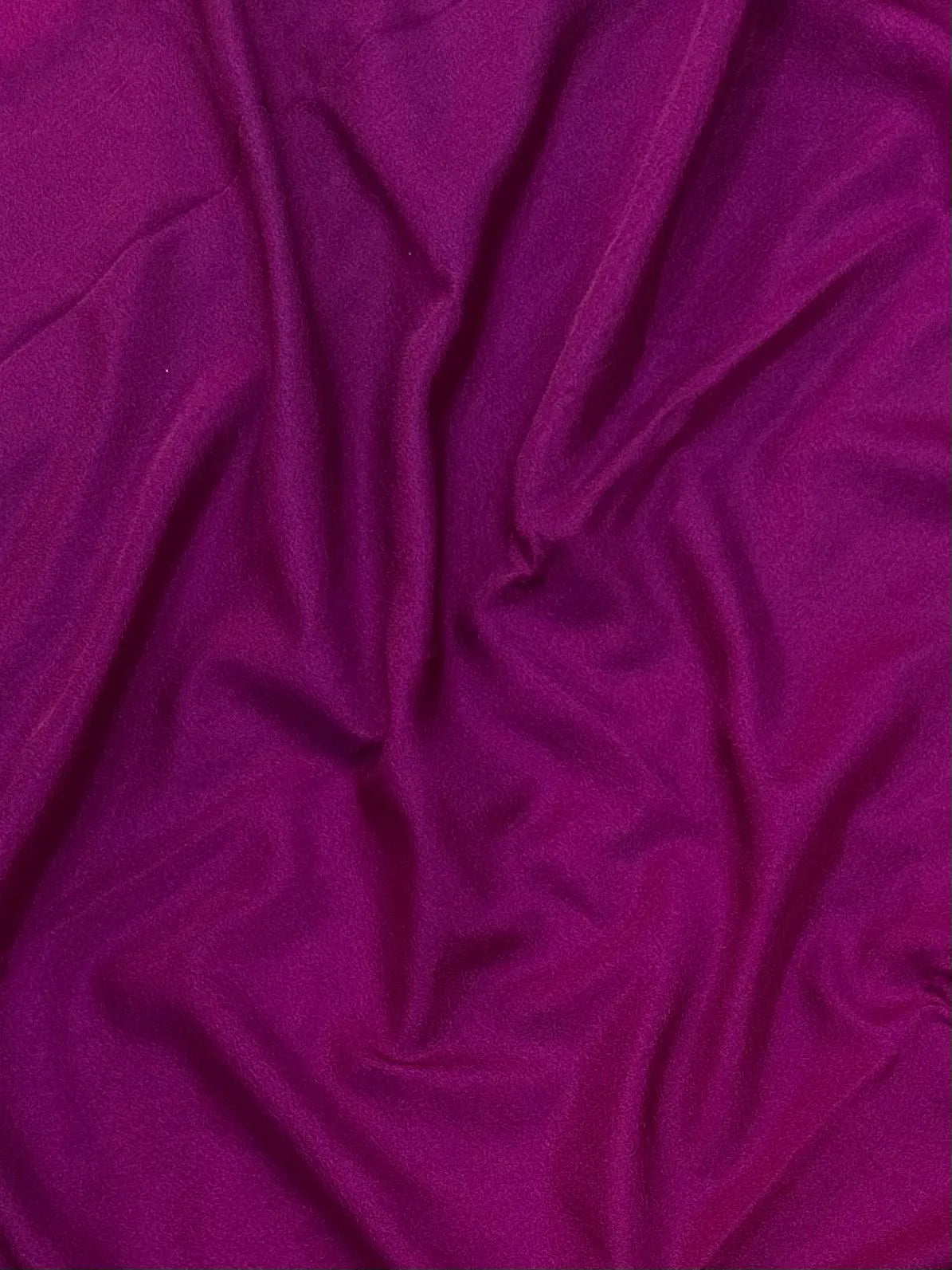 Woman draped in a Semi Crepe Silk Saree with soft texture and subtle shine, perfect for elegant office wear and festive occasions.