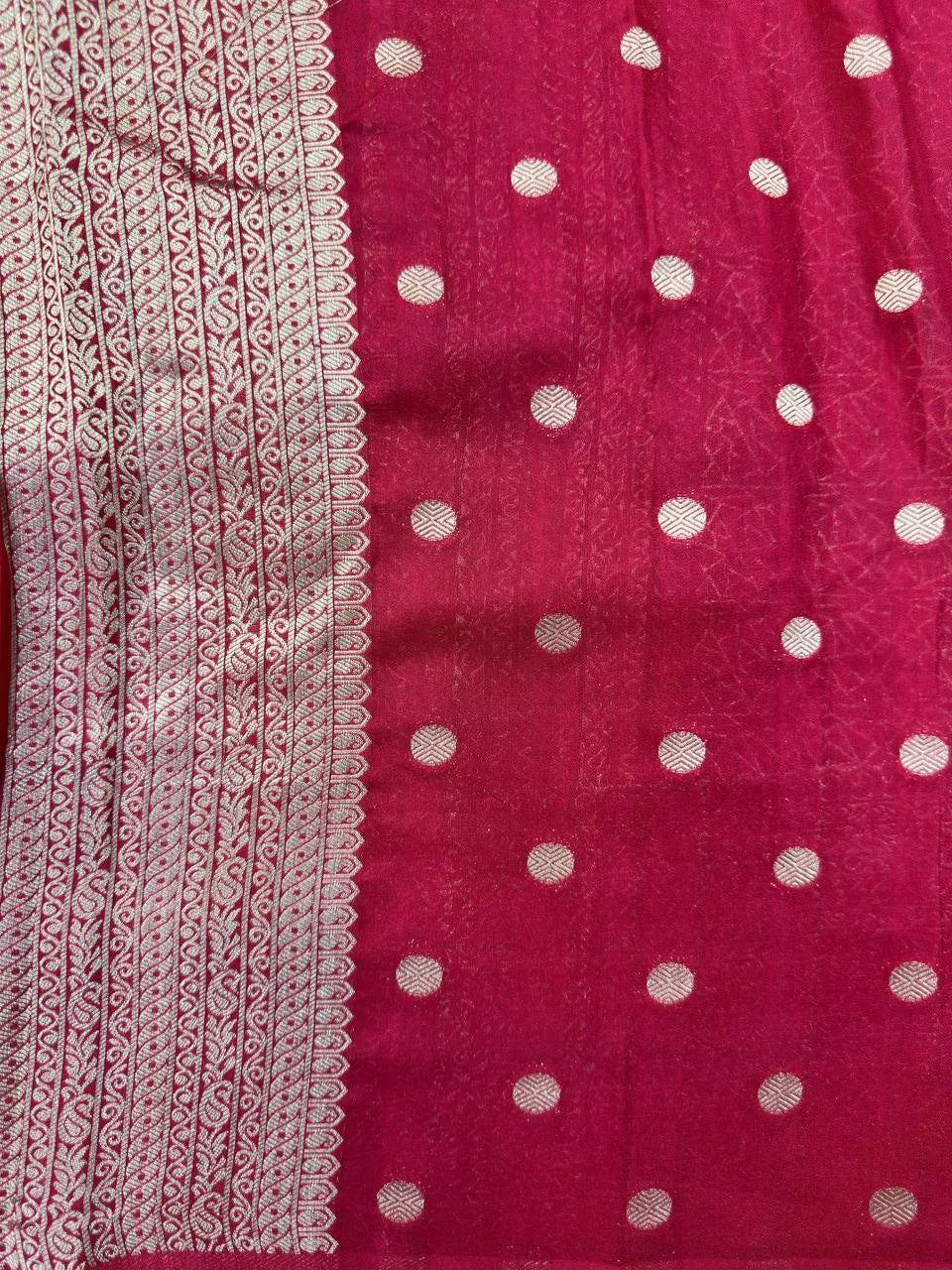 A beautifully draped Semi Banarasi Georgette Saree featuring intricate patterns and delicate weaving. The saree’s lightweight and breathable fabric ensures comfort, making it an ideal choice for daily wear. Perfectly blending traditional design with modern elegance, this saree is suitable for casual and formal occasions.