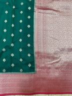A beautifully draped Semi Banarasi Georgette Saree featuring intricate patterns and delicate weaving. The saree’s lightweight and breathable fabric ensures comfort, making it an ideal choice for daily wear. Perfectly blending traditional design with modern elegance, this saree is suitable for casual and formal occasions.