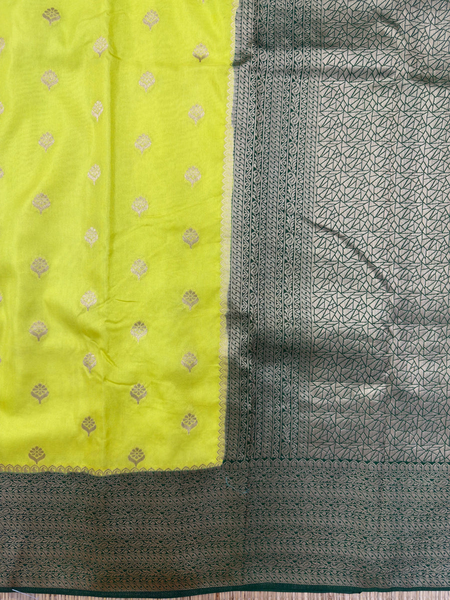 A beautifully draped Semi Banarasi Georgette Saree featuring intricate patterns and delicate weaving. The saree’s lightweight and breathable fabric ensures comfort, making it an ideal choice for daily wear. Perfectly blending traditional design with modern elegance, this saree is suitable for casual and formal occasions.