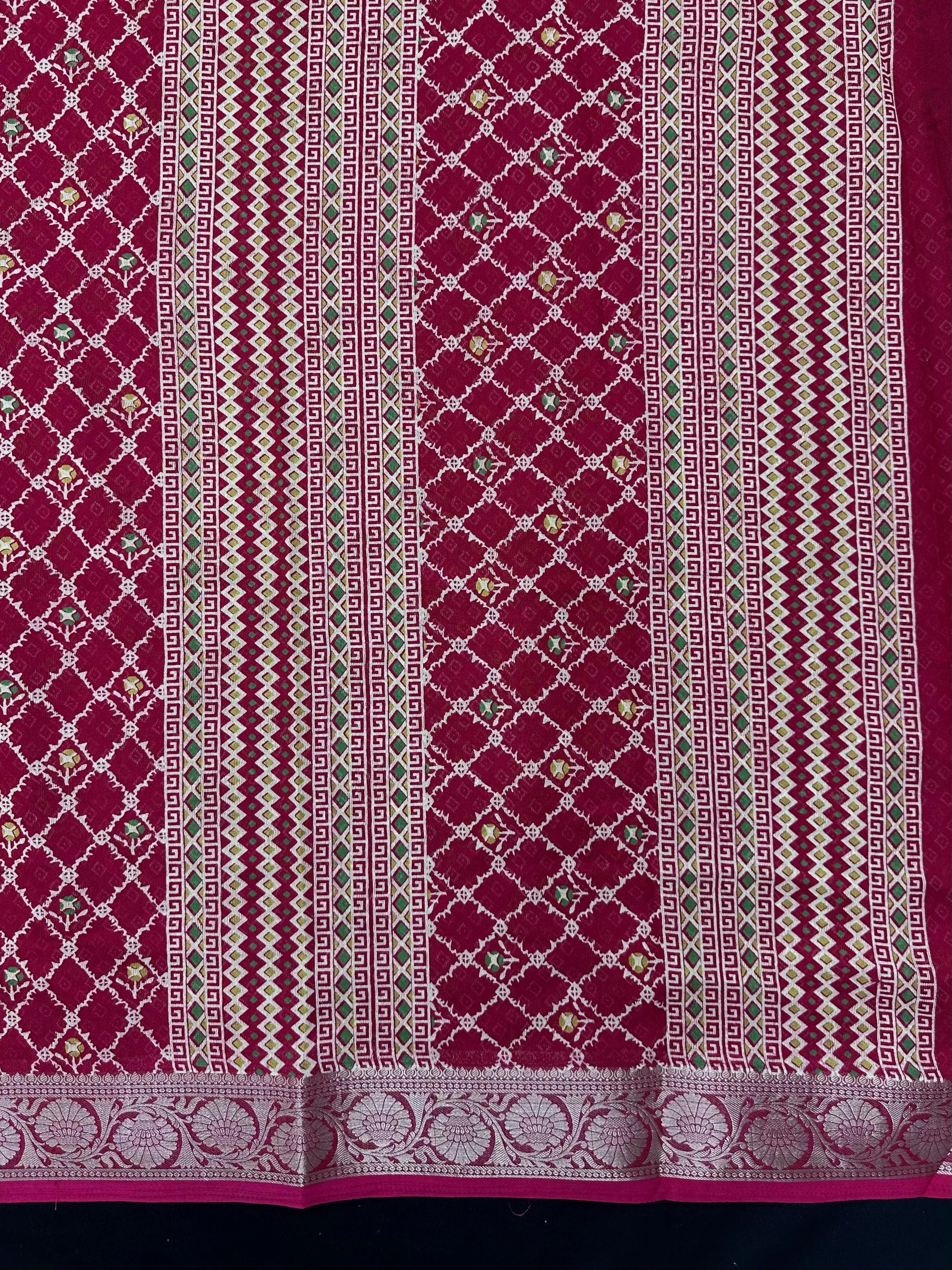 Woman wearing a Semi Georgette Silk Saree with a soft flowing drape and subtle silk shine, perfect for festive and formal occasions.