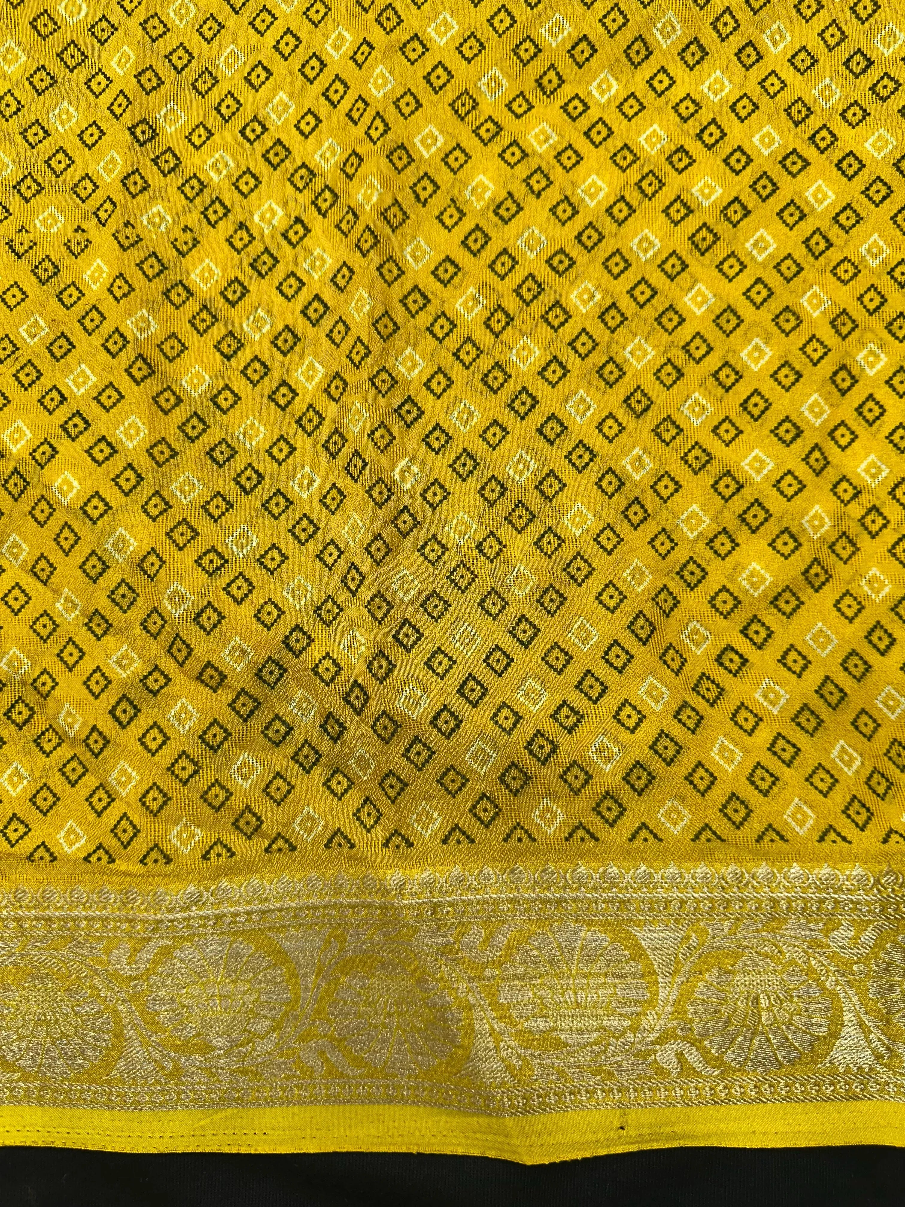 Woman wearing a Semi Georgette Silk Saree with a soft flowing drape and subtle silk shine, perfect for festive and formal occasions.