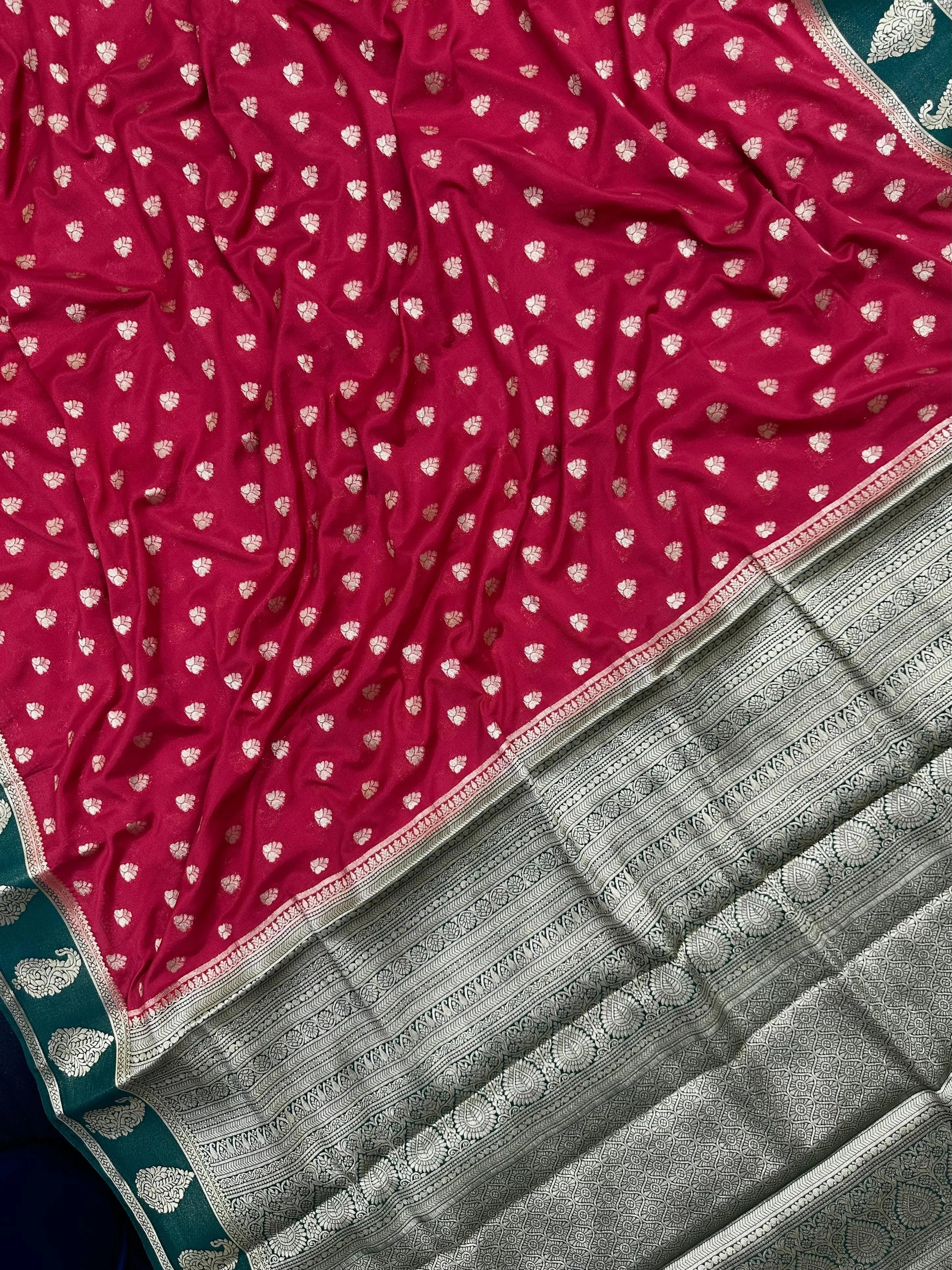 Woman wearing a Semi Khaddi Georgette Saree with soft fabric and zari highlights, ideal for festive and traditional occasions.