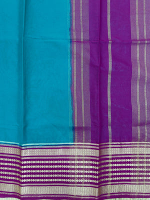 "Semi Mysore Silk Saree in a soft, breathable fabric with a smooth drape, perfect for daily wear. Subtle sheen and elegant design, ideal for both casual and formal occasions."