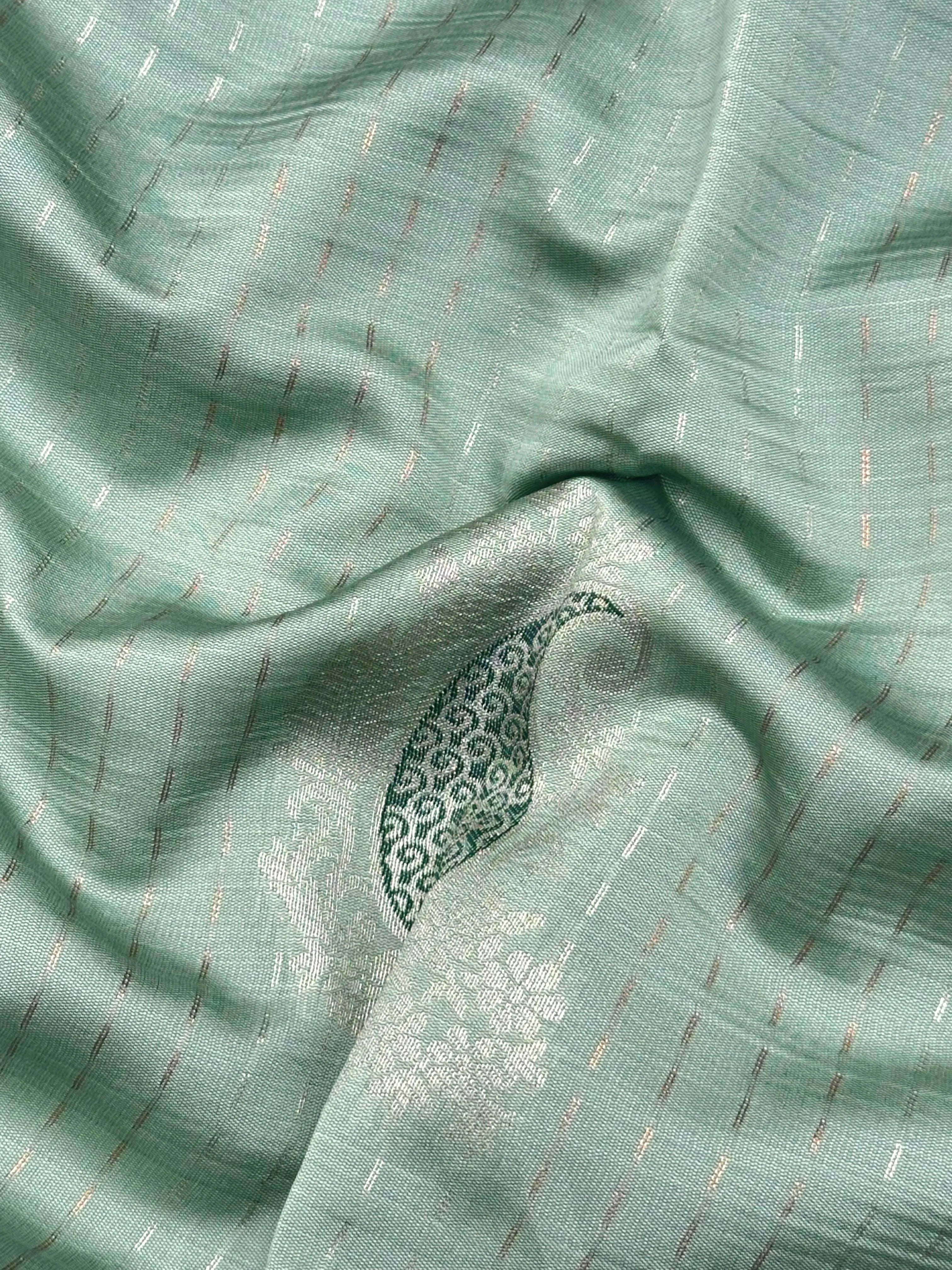 Woman wearing a Semi Silk Saree with light sheen and smooth texture – perfect for casual, office, or festive occasions.
