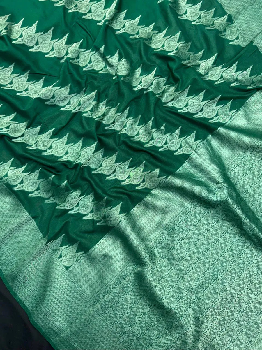 Woman wearing a Semi Silk Saree with smooth, shiny finish and lightweight fabric, ideal for festive and everyday occasions.