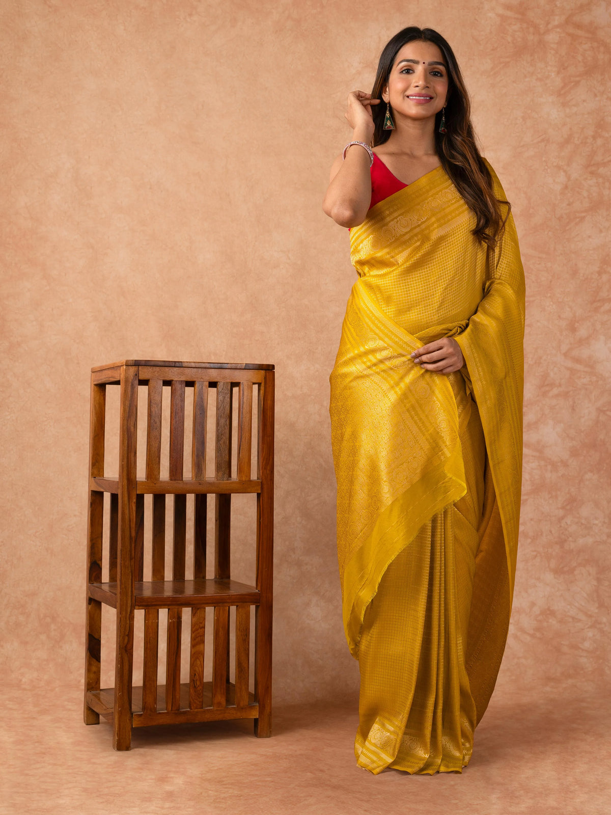 Woman wearing a Semi Silk Saree with lightweight drape and subtle shine, ideal for office wear, family gatherings, and festive occasions.