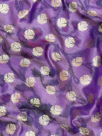 Woman wearing a Semi Silk Saree with lightweight fabric and soft sheen, ideal for weddings, festive occasions, and office wear.