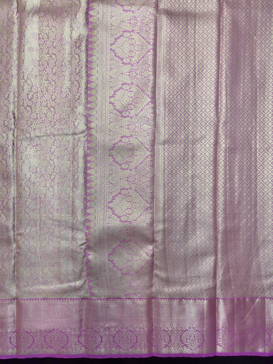 Woman wearing a Semi Silk Saree with lightweight fabric and subtle shine, ideal for weddings, festivals, and special events.