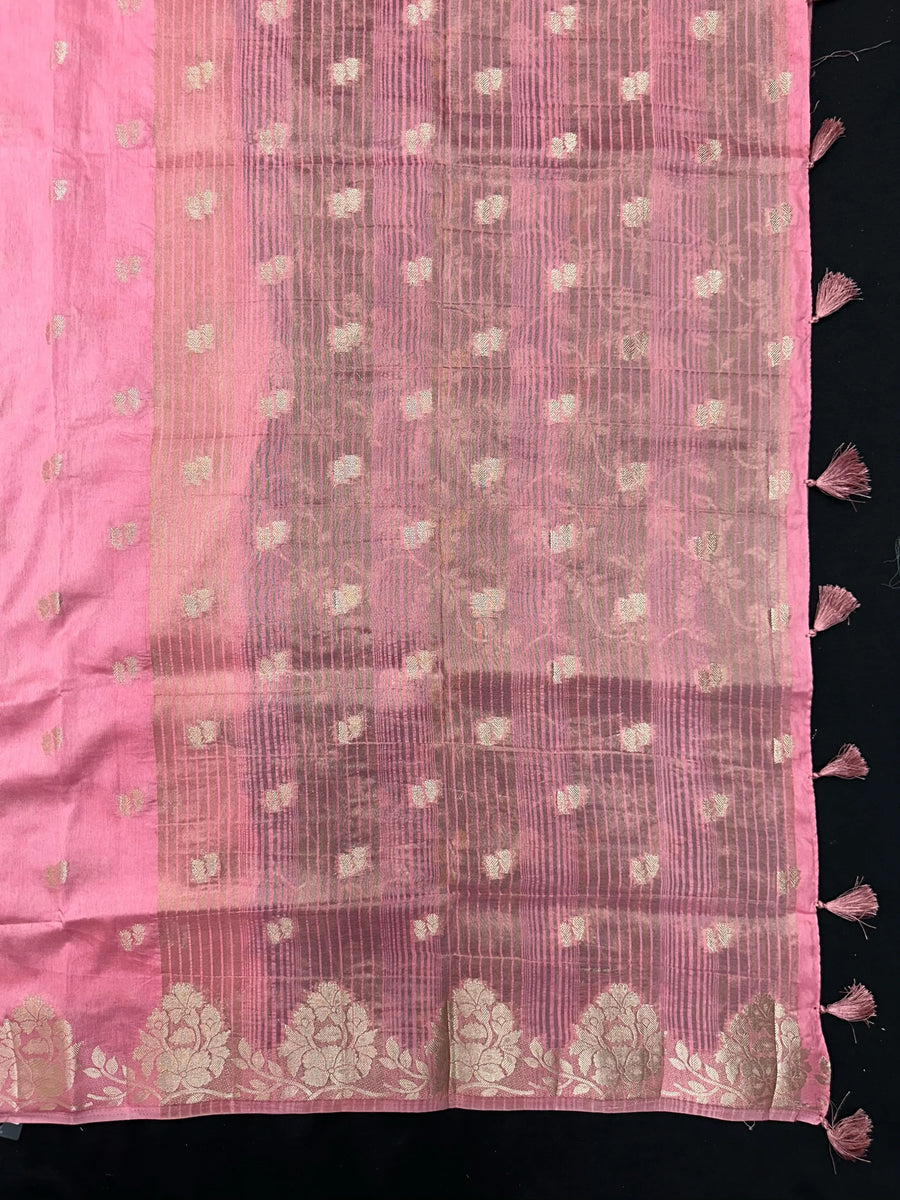 Woman wearing a Semi Silk Saree with lightweight drape and subtle shine, perfect for office, family gatherings, and festive occasions.