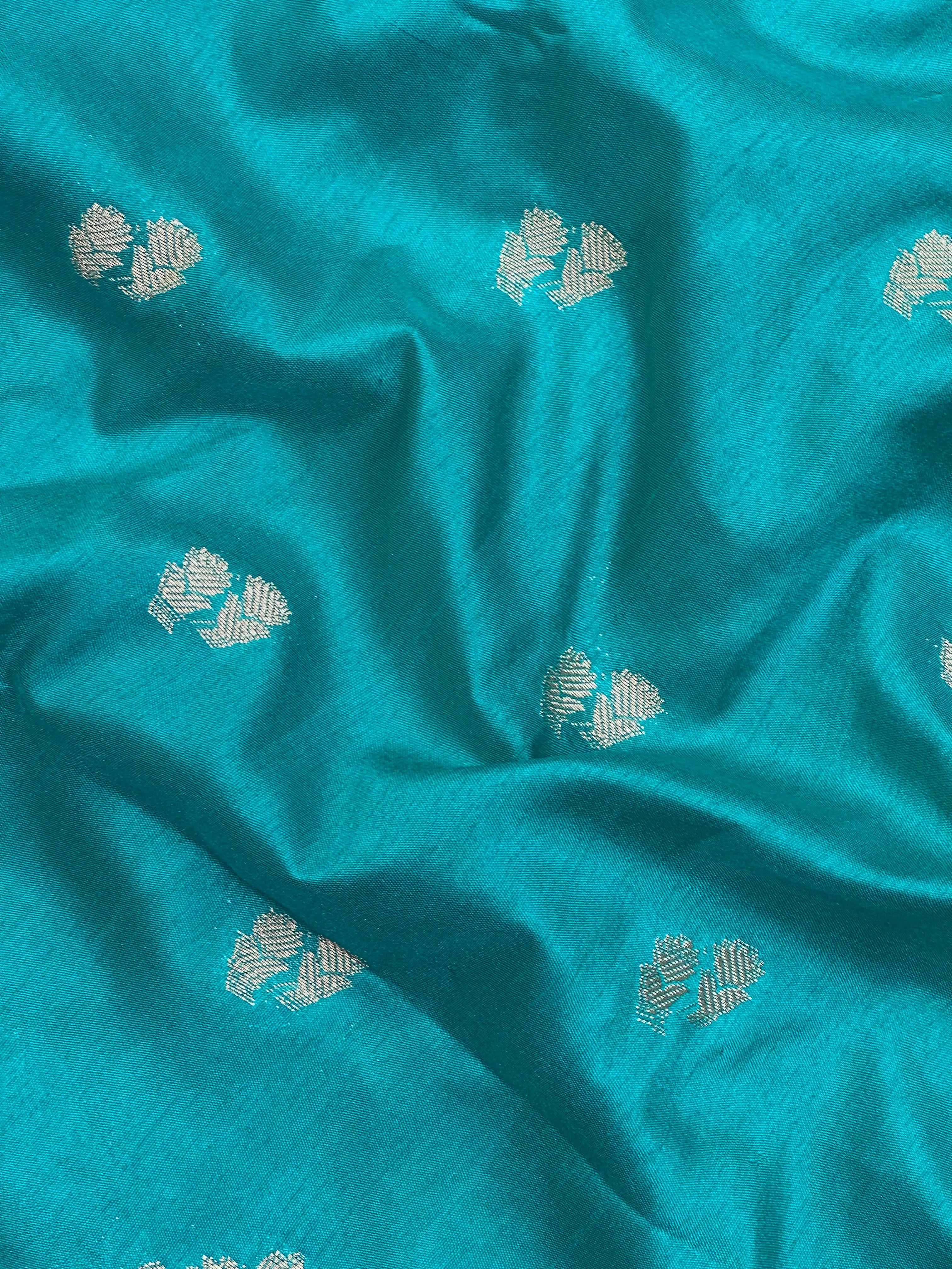 Woman wearing a Semi Silk Saree with lightweight drape and subtle shine, perfect for office, family gatherings, and festive occasions.