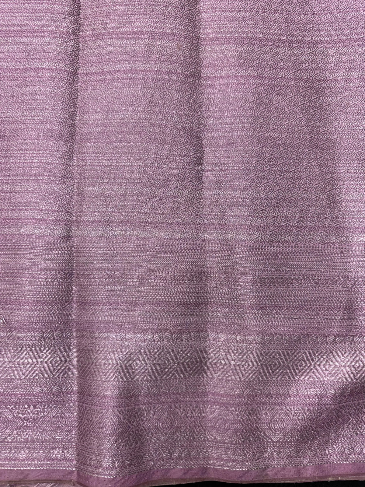 Woman wearing a Semi Silk Saree with a soft shine and lightweight drape, ideal for everyday elegance and traditional style.