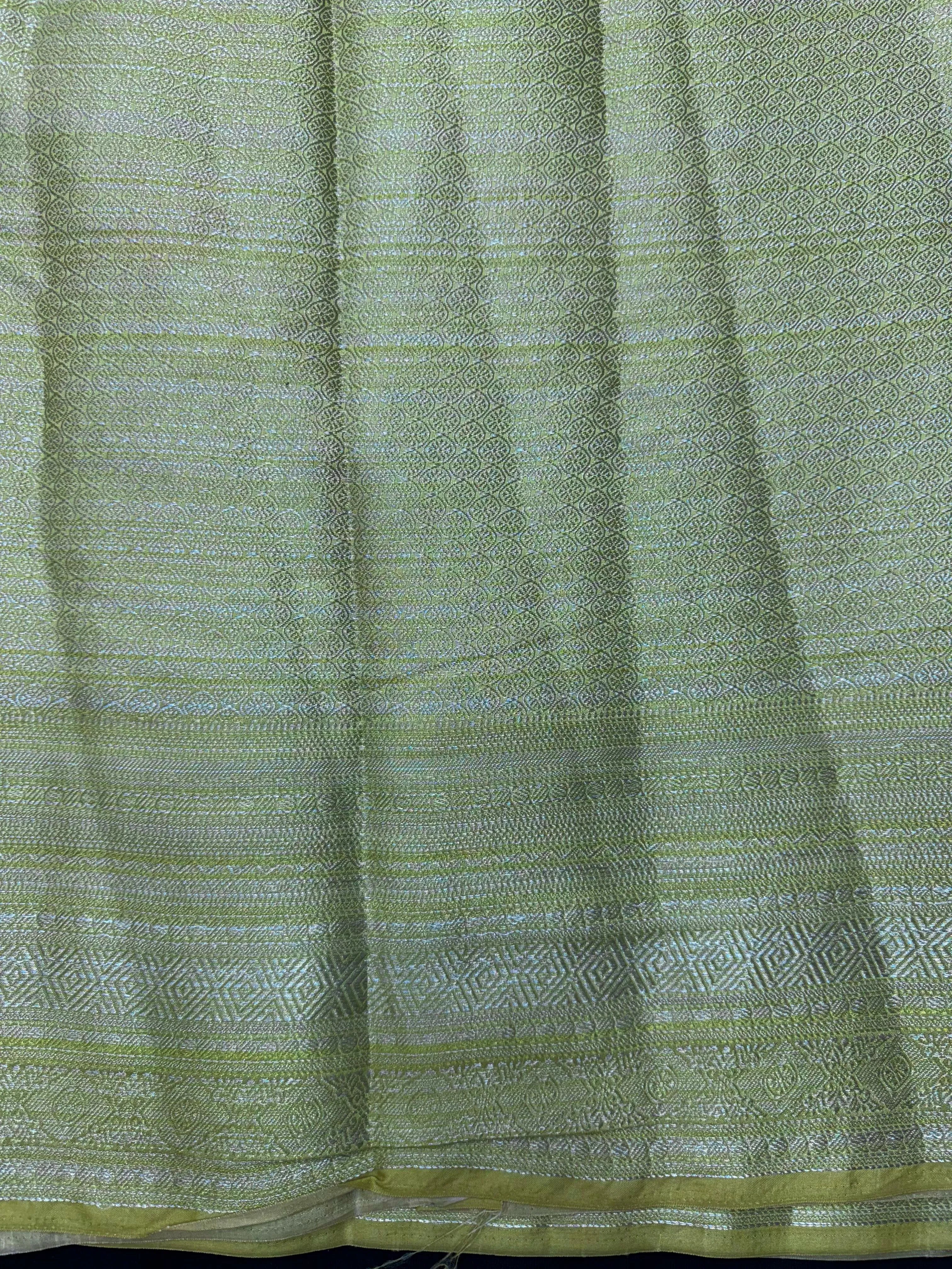 Woman wearing a Semi Silk Saree with a soft shine and lightweight drape, ideal for everyday elegance and traditional style.