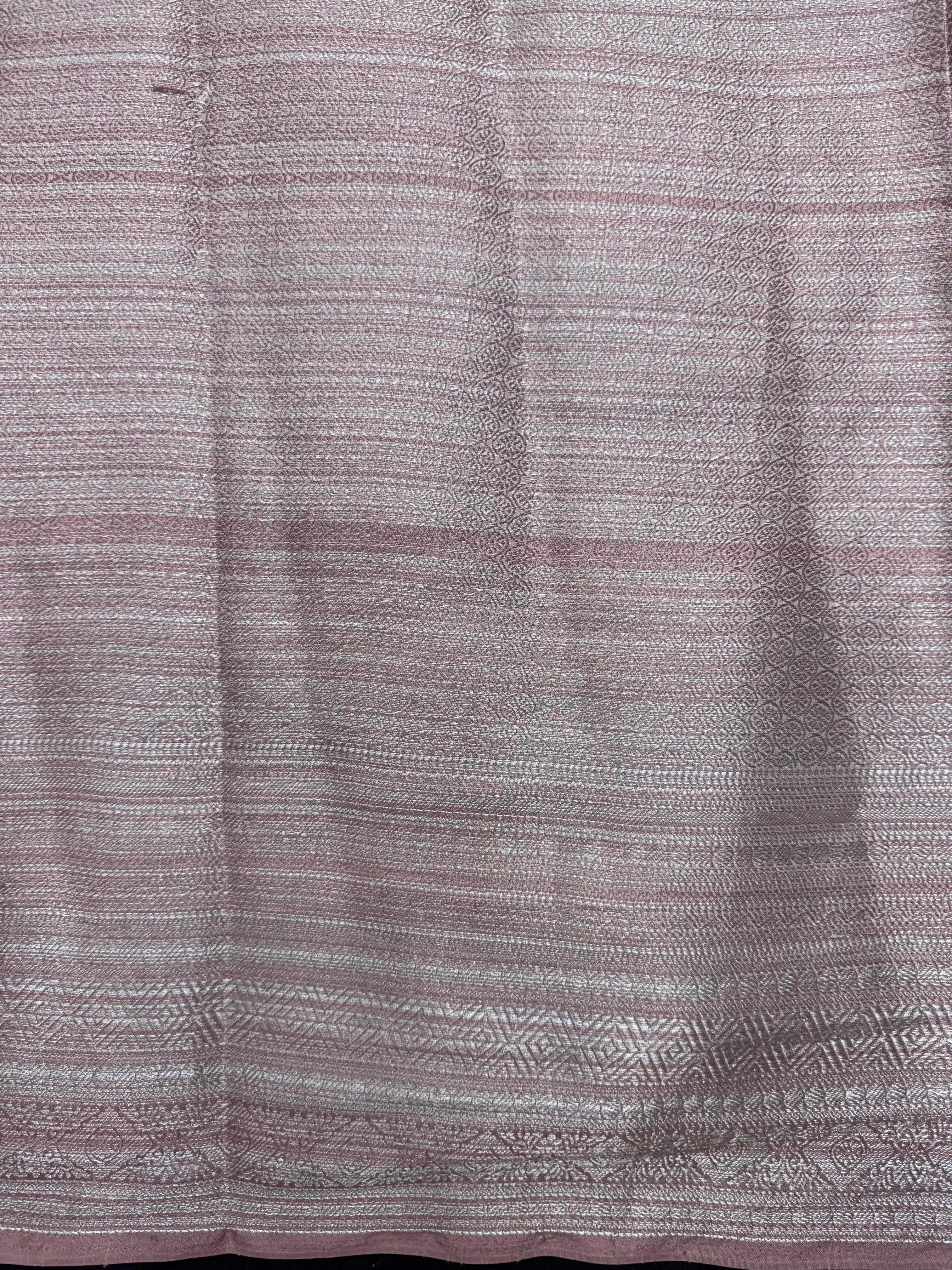 Woman wearing a Semi Silk Saree with a soft shine and lightweight drape, ideal for everyday elegance and traditional style.