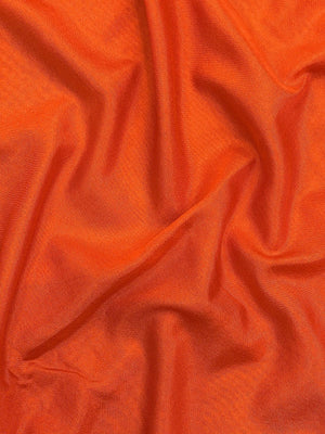Woman draped in a Semi Crepe Silk Saree with soft texture and subtle shine, perfect for elegant office wear and festive occasions.