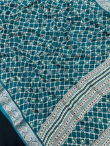 Woman wearing a Semi Georgette Silk Saree with a soft flowing drape and subtle silk shine, perfect for festive and formal occasions.