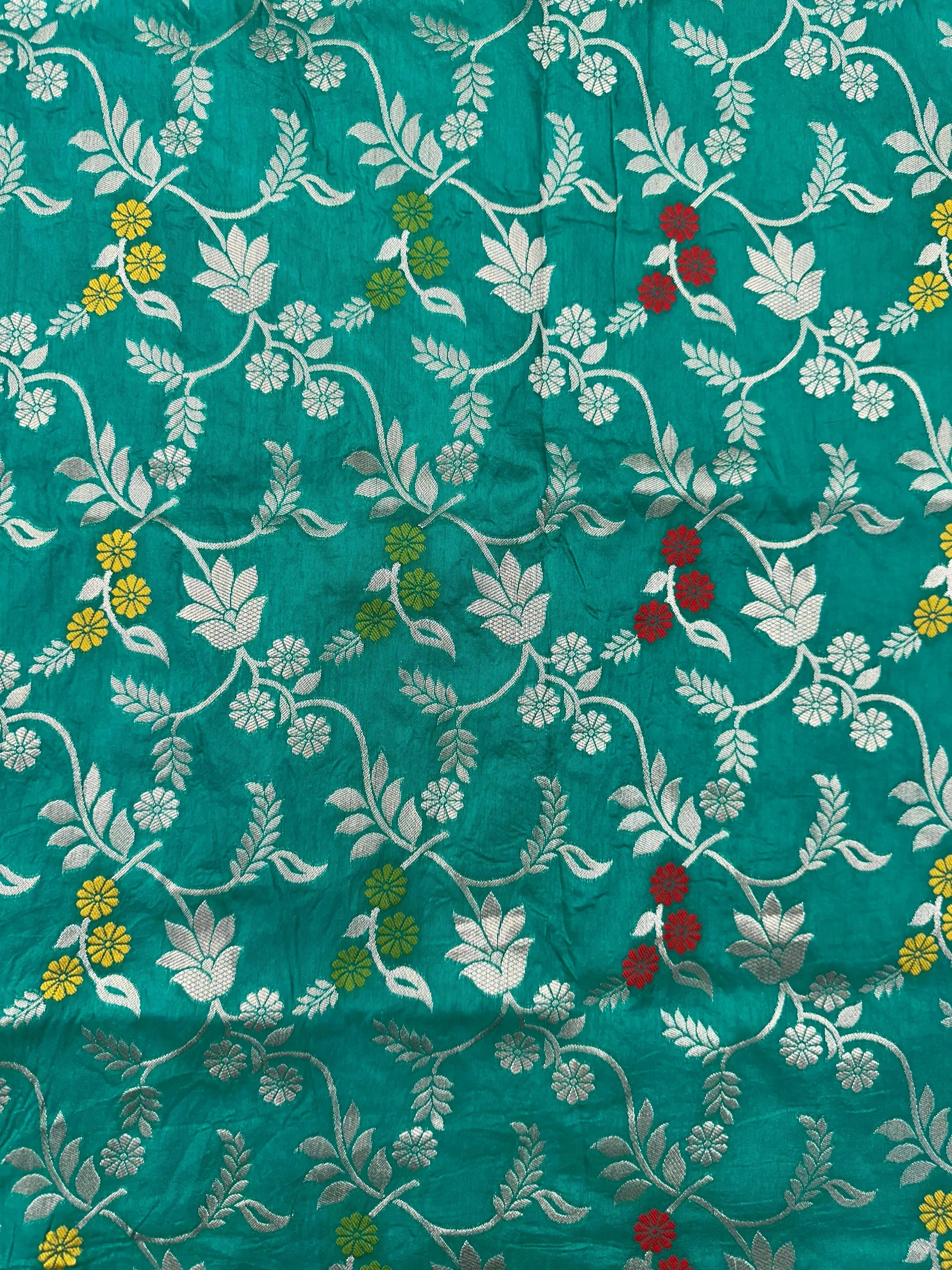 Woman wearing a Semi Silk Saree with lightweight drape and subtle shine, perfect for office, family gatherings, and festive occasions.