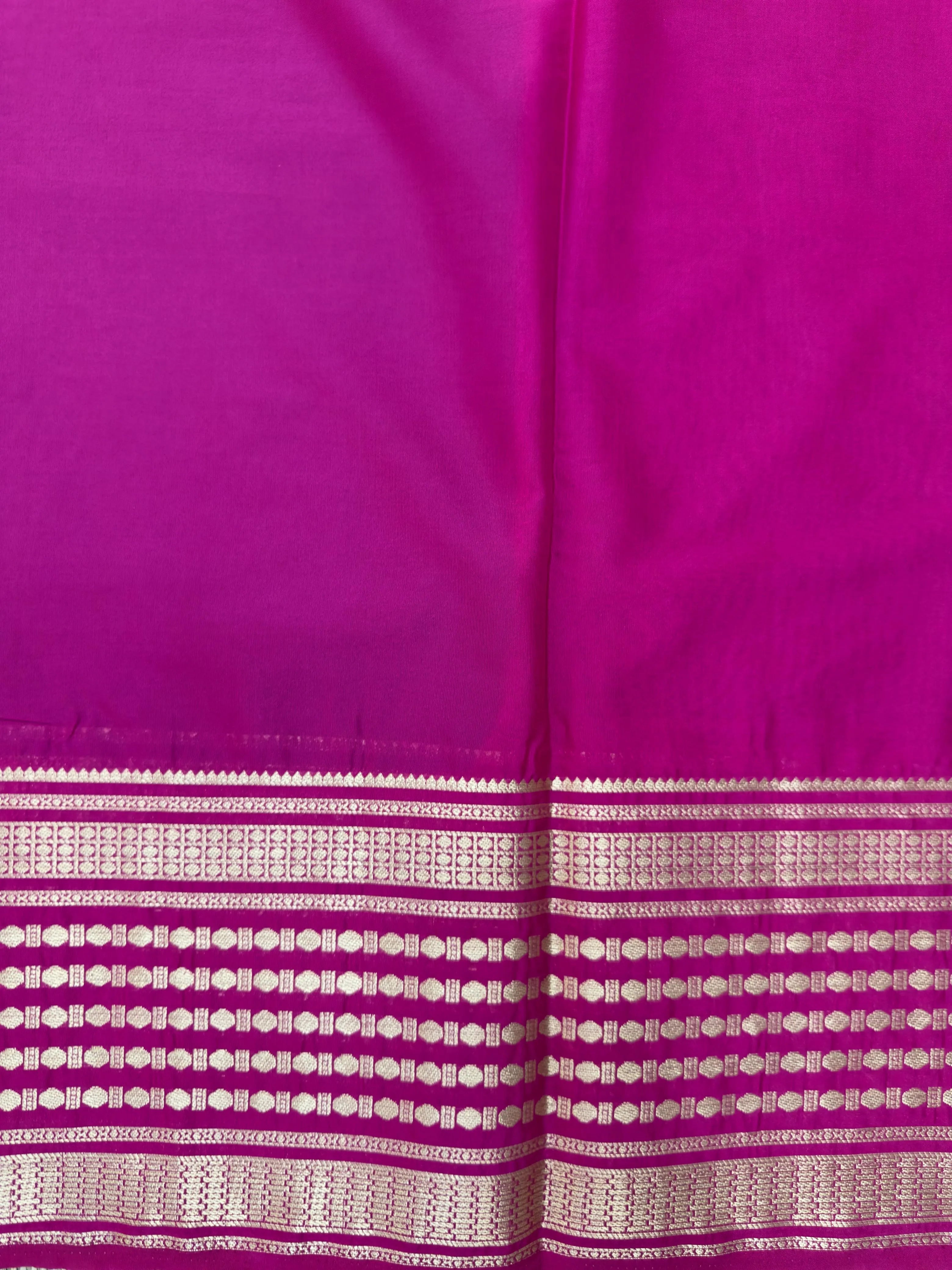 "Semi Mysore Silk Saree in a soft, breathable fabric with a smooth drape, perfect for daily wear. Subtle sheen and elegant design, ideal for both casual and formal occasions."