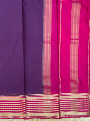 "Semi Mysore Silk Saree in a soft, breathable fabric with a smooth drape, perfect for daily wear. Subtle sheen and elegant design, ideal for both casual and formal occasions."