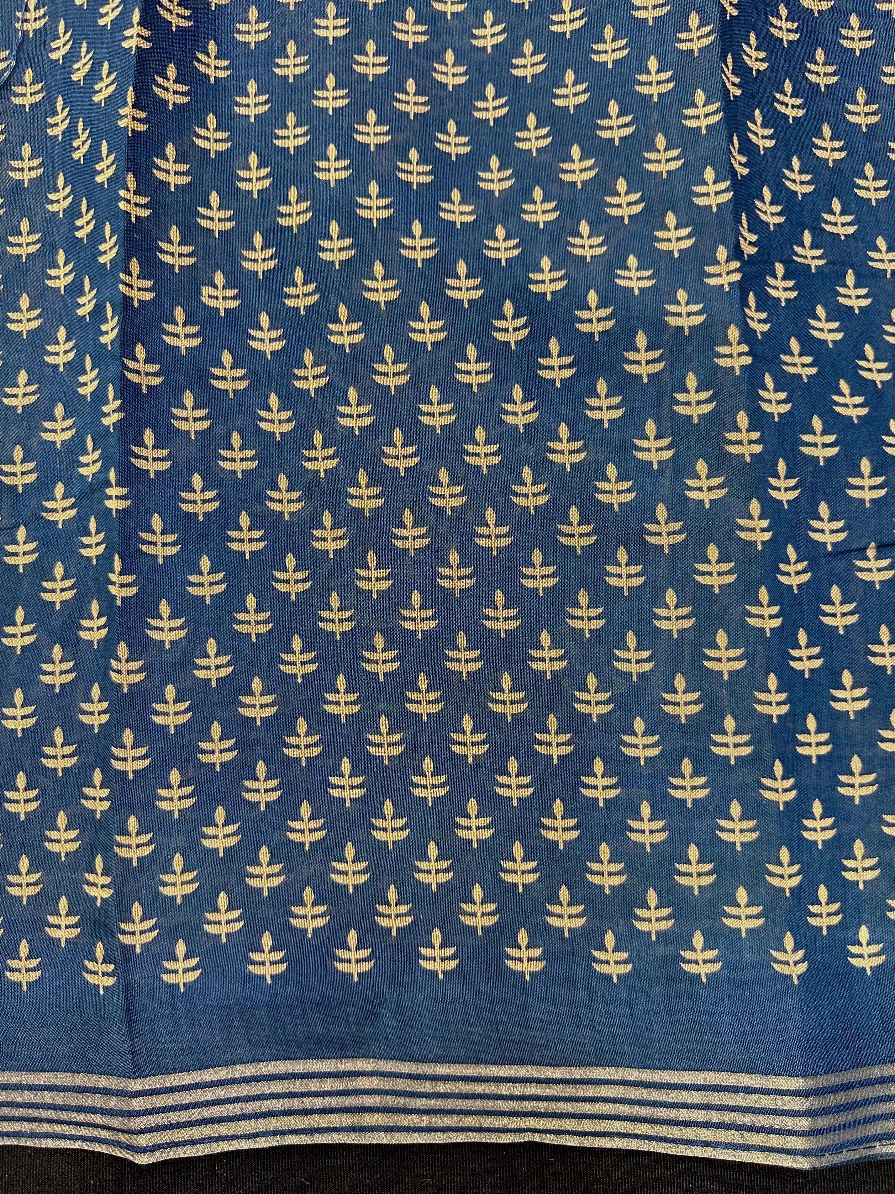 Woman wearing a Soft Tussar Silk Saree with subtle sheen and lightweight drape, perfect for daily wear and festive elegance.