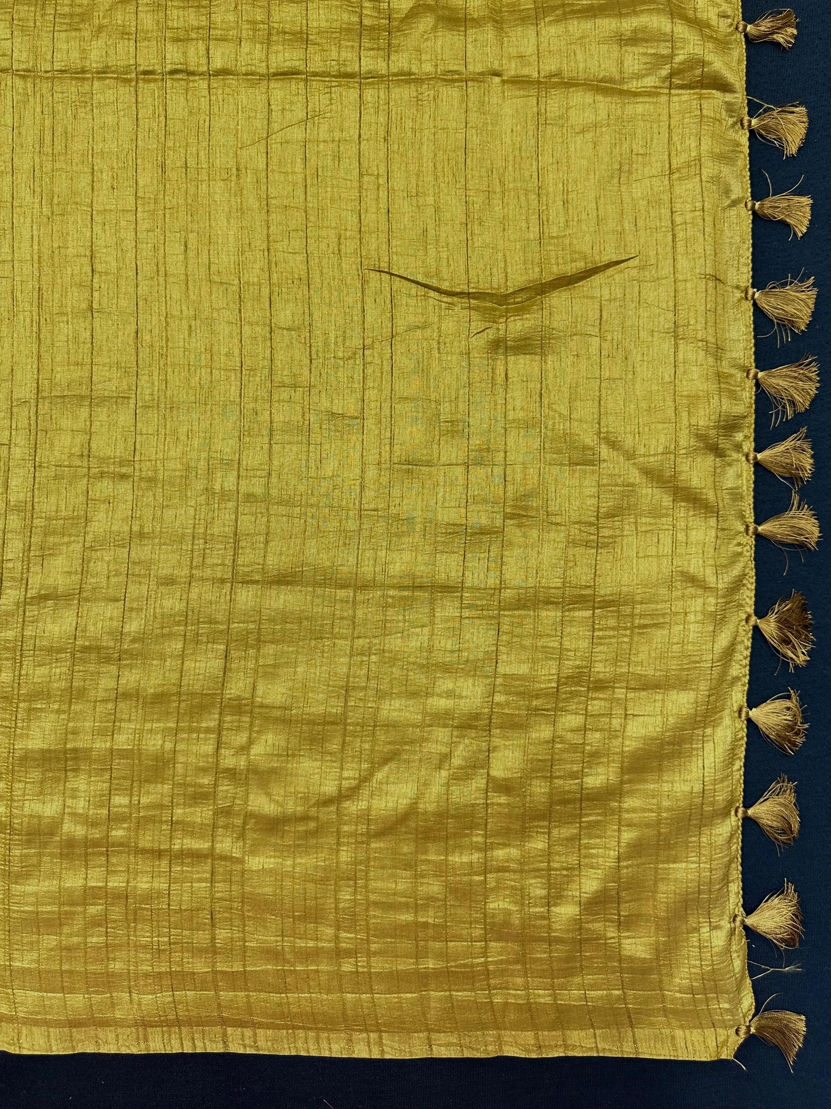 Woman draped in a Soft Tussar Silk Saree with subtle shine and fluid texture, ideal for elegant everyday and festive occasions.