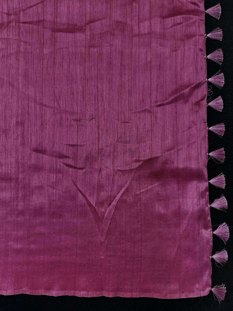 Woman draped in a Soft Tussar Silk Saree with subtle shine and fluid texture, ideal for elegant everyday and festive occasions.
