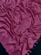 Woman draped in a Soft Tussar Silk Saree with subtle shine and fluid texture, ideal for elegant everyday and festive occasions.