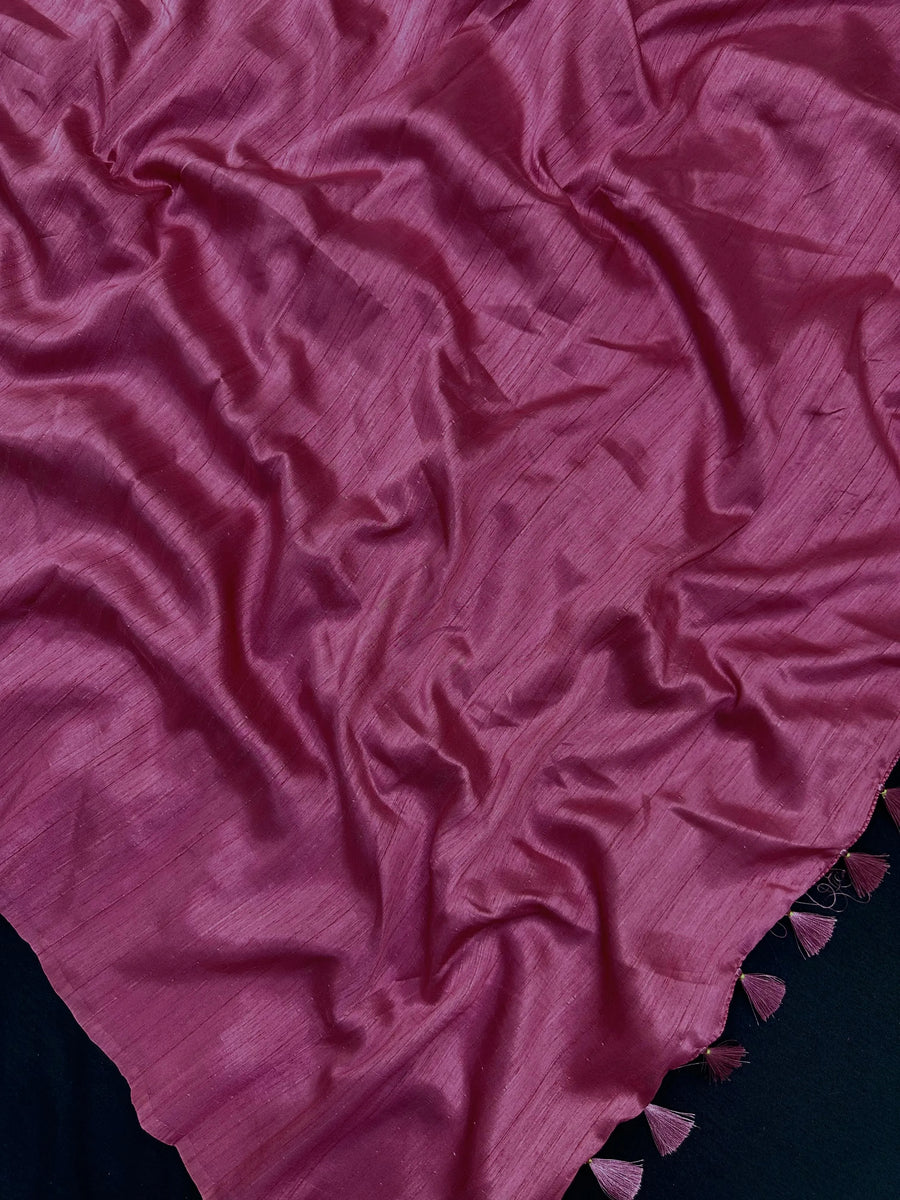Woman draped in a Soft Tussar Silk Saree with subtle shine and fluid texture, ideal for elegant everyday and festive occasions.