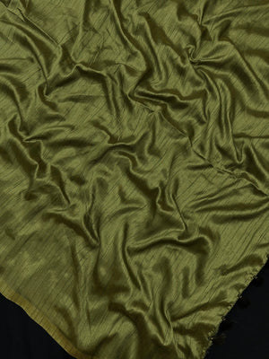 Woman draped in a Soft Tussar Silk Saree with subtle shine and fluid texture, ideal for elegant everyday and festive occasions.