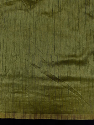 Woman draped in a Soft Tussar Silk Saree with subtle shine and fluid texture, ideal for elegant everyday and festive occasions.